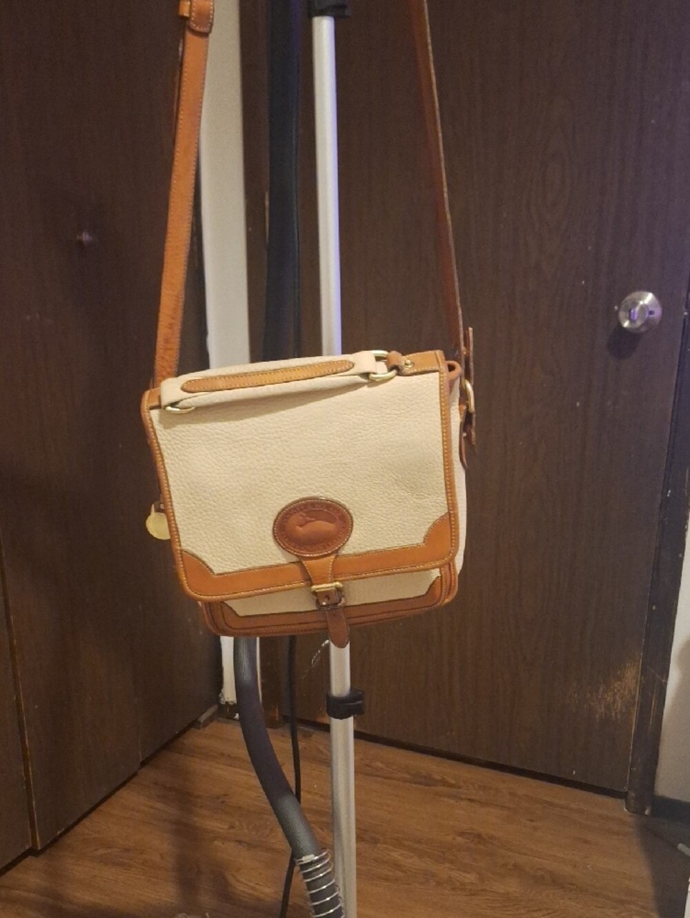 Dooney & Bourke Cream and Tan Pebbled Leather Crossbody - Picture 2 of 11